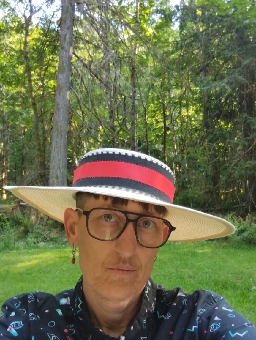 Straw Boater Hat with Red and Black Band With Bow At Back